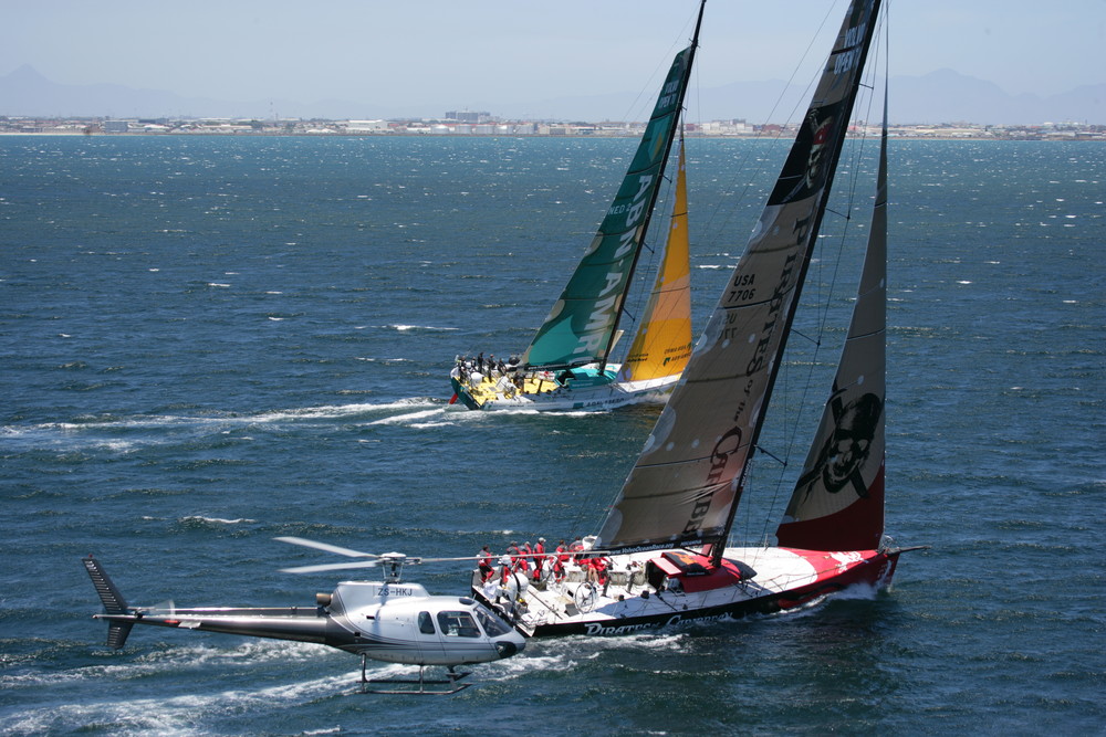 Volvo Open 70 ABN AMRO TWO in action alongside  The Black Pearl during the In Port race off Cape Town ©Jon Nash