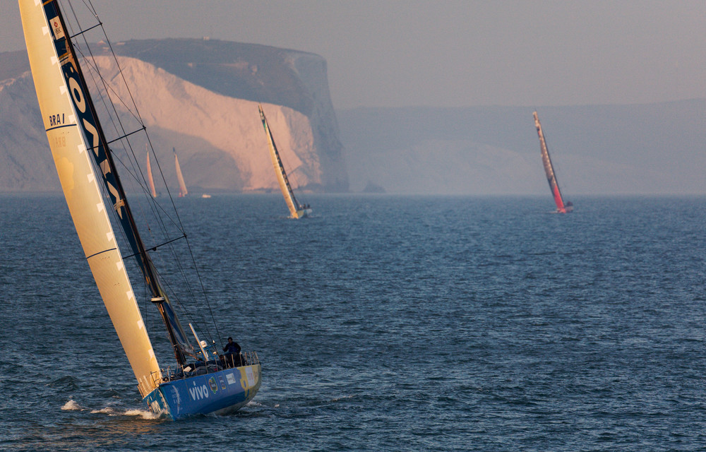 Brasil 1 leading the Volvo Open 70 fleet after passing the Needles.  Start of leg 8 in the Volvo Ocean Race, Portsmouth. The fleet heads out of the Solent, round the British Isles and finish in Rotterdam, NDL. ***EDITORIAL USE ONLY*** © Oskar Kihlborg/ Volvo Ocean Race   For further images please visit http://images.volvooceanrace.org